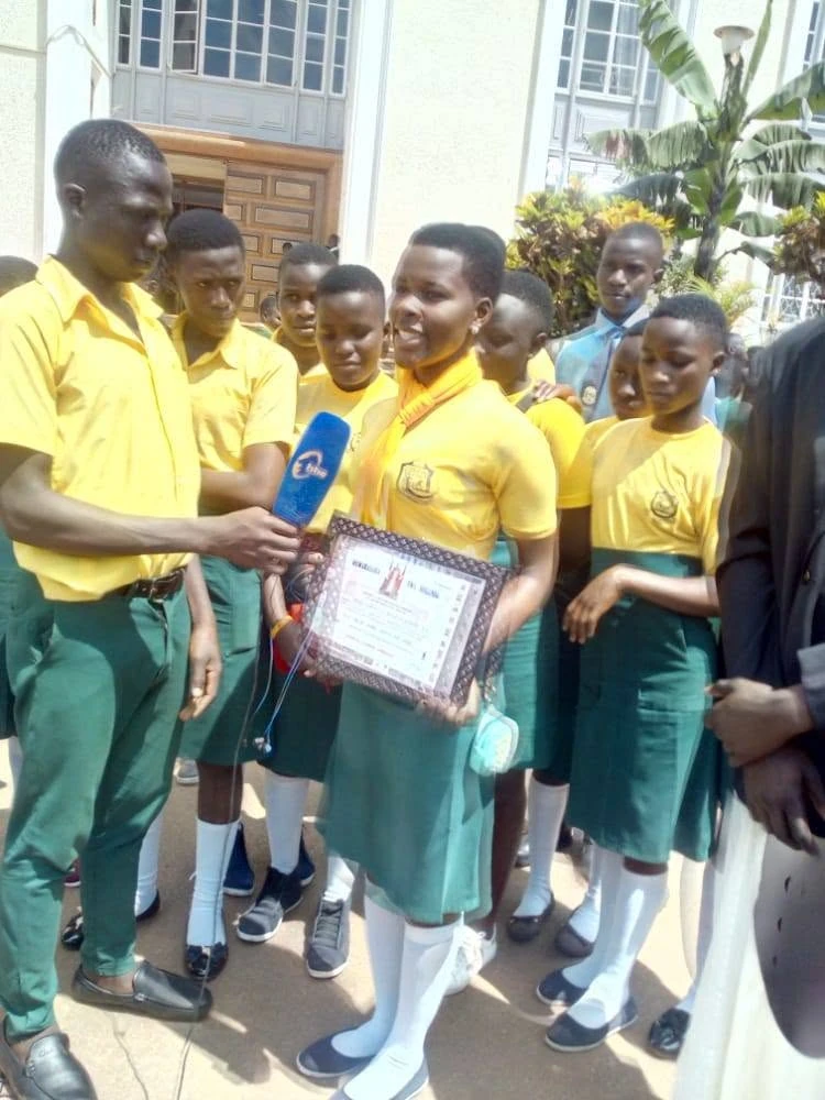 St Paul Kyanukuzi student taking part in a media interview