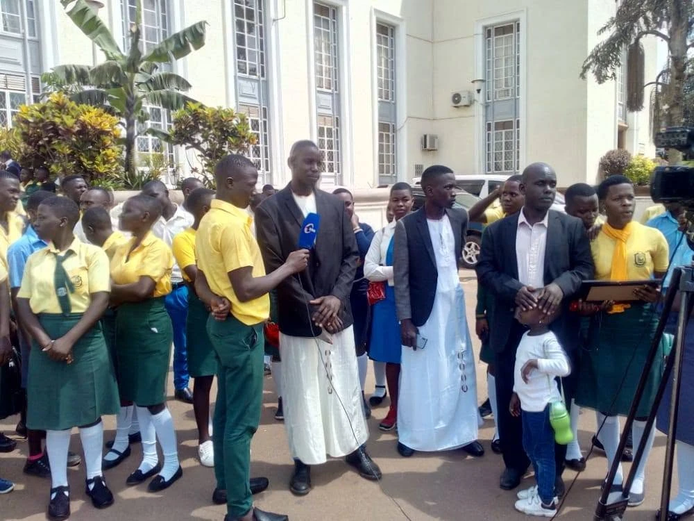 St Paul Kyanukuzi students during a community educational visit
